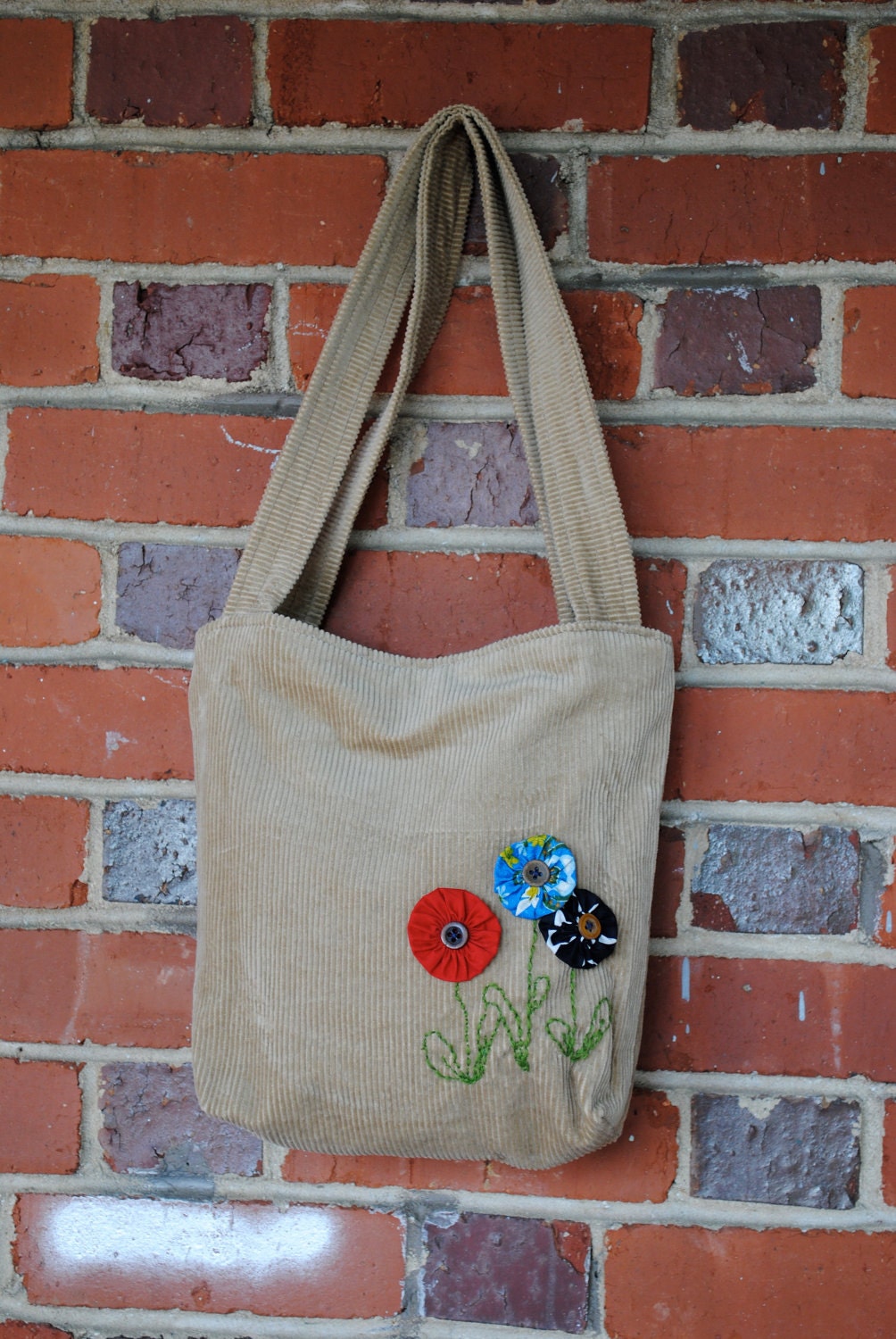 Funky corduroy bag with yoyo flowers