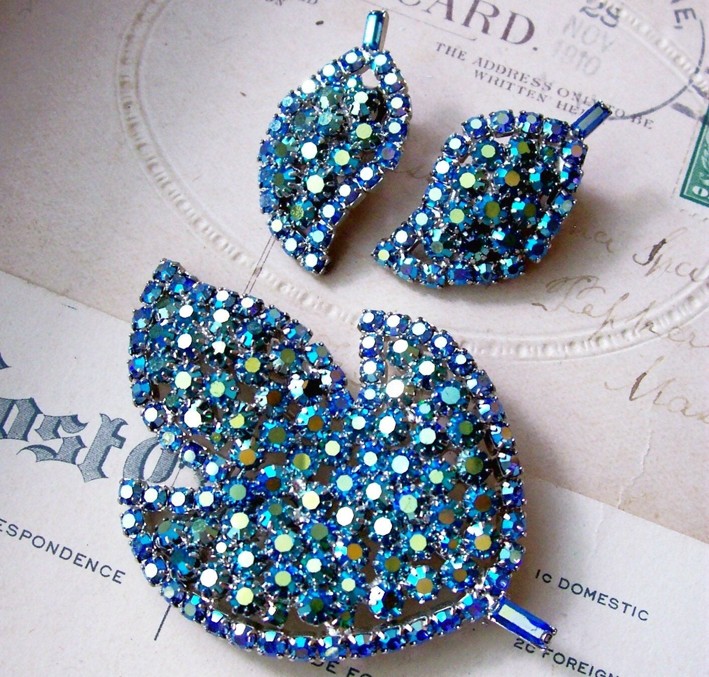 Vintage AB blue teal rhinestone leaf brooch and earrings demi parure