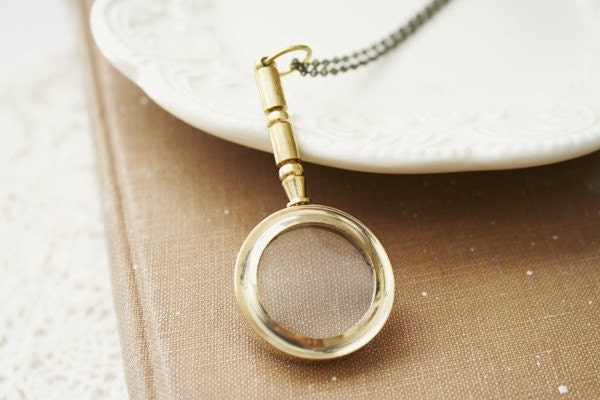 the impressionist - a detective magnifying glass necklace.