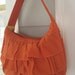 Burnt Orange Ruffle Bag with Wide Shoulder Strap and Zipper Closure