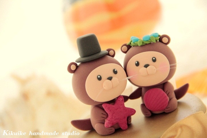 bride and groom otter ocean theme Wedding Cake Topper