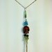 Hand Hammered Silver and Wood Skull Necklace with Neon Blue Apatite & Greem Tourmalines