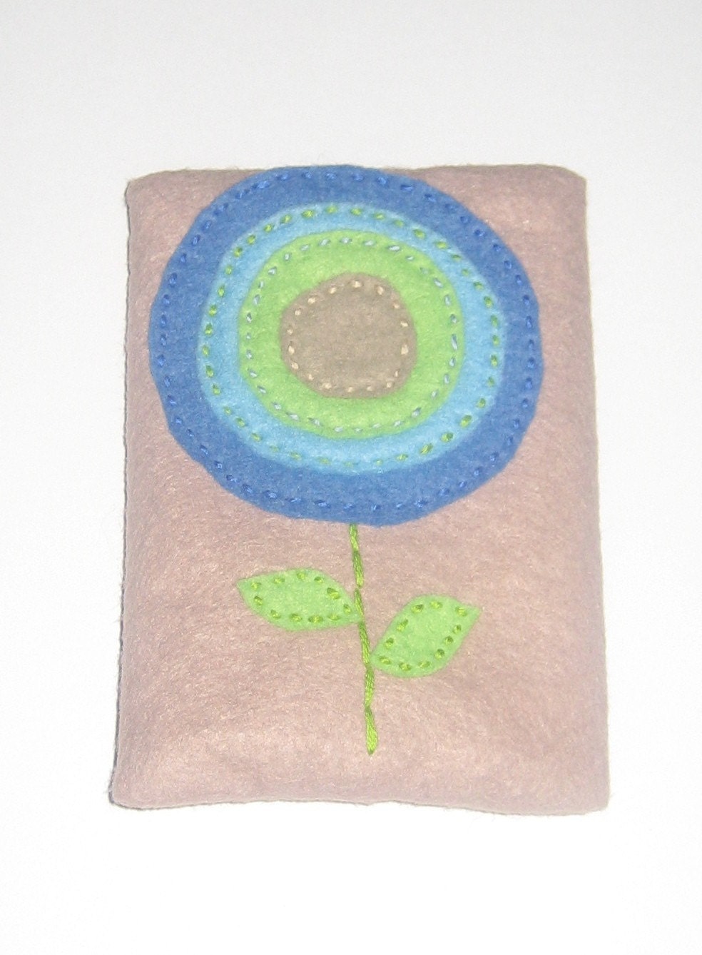 Blue, Green, and Beige Lollipop Flower on Beige Tissue Cozy