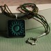 Necklace Multi Strand Green Brown Woodland Sun Pendant