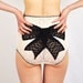 Lace panties with Black lace bow applique.