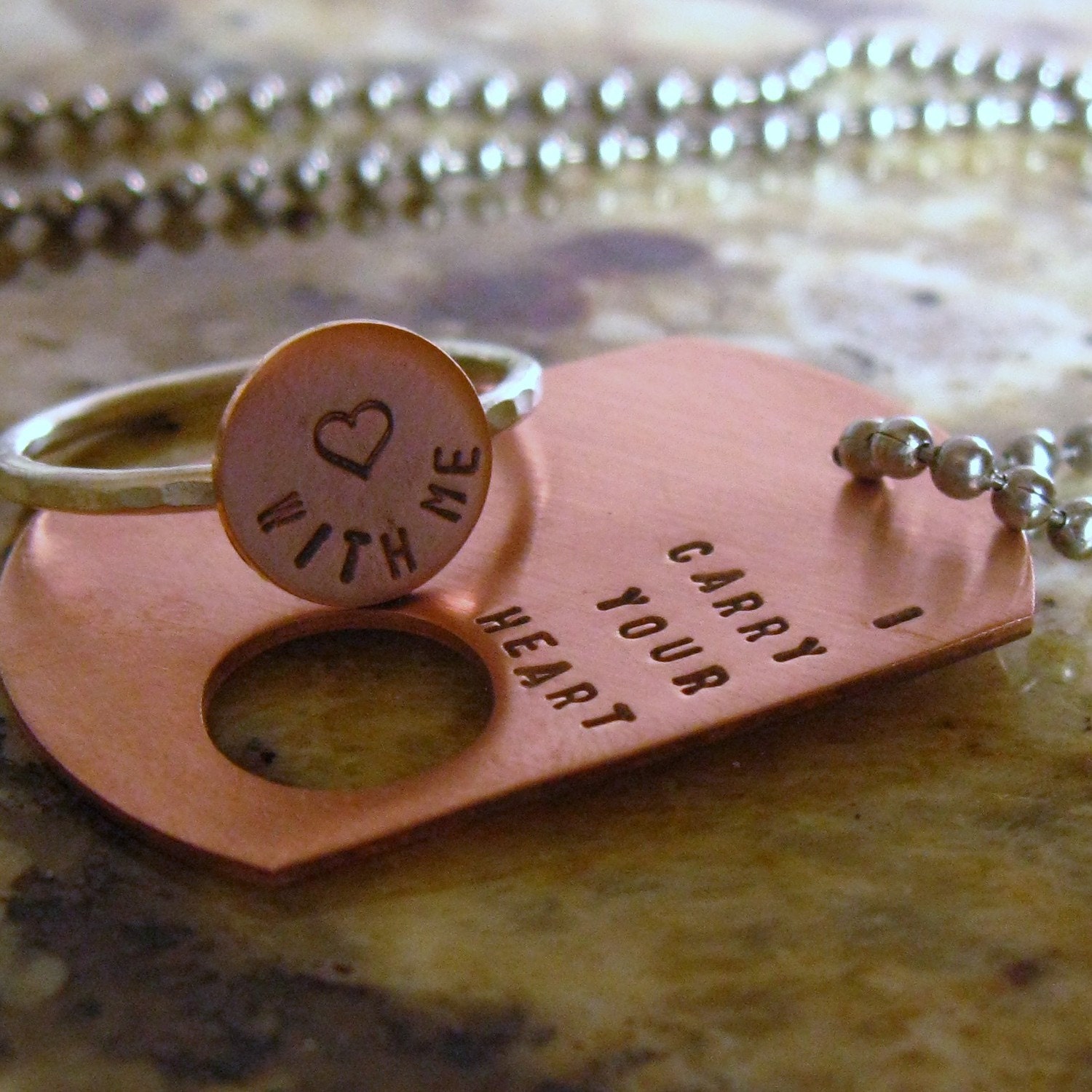 I carry your heart. Copper dog tag and sterling silver ring (intertwine)