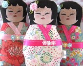 Japanese Kokeshi Art Doll with fushia pink ribbon