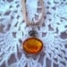 Orange & Purple Terling Pendant on taupe deerskin long leather adjustable cord with Earrings