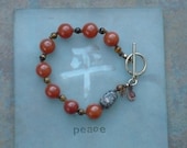 red aventurine and tigers eye knotted bracelet