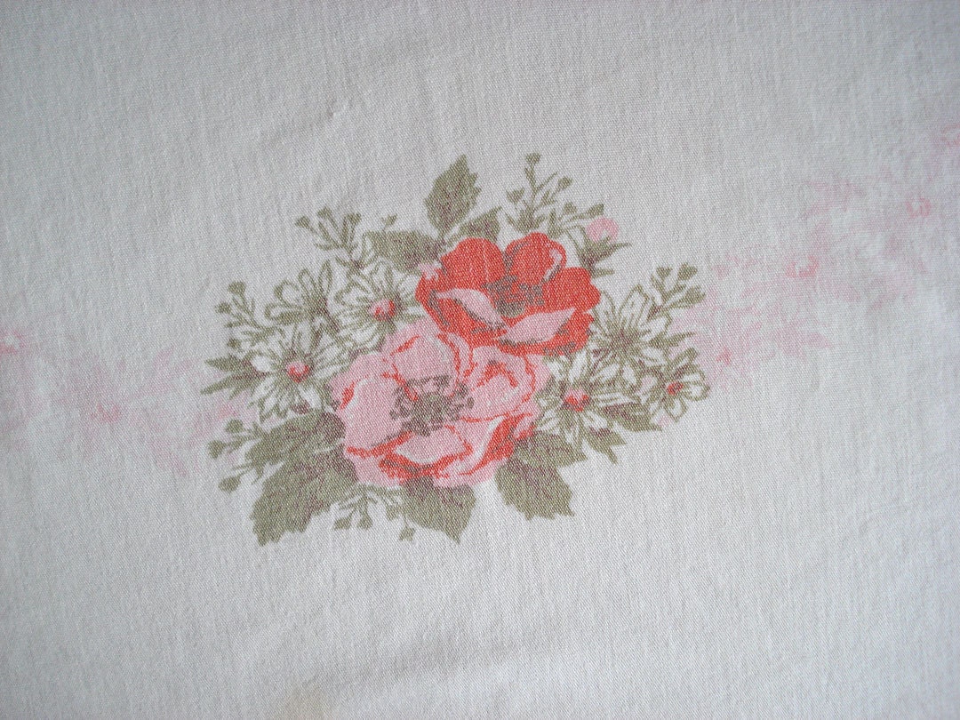 White cotton tablecloth with pink and orange flowers