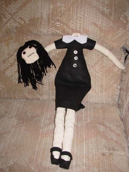 headless doll addams family