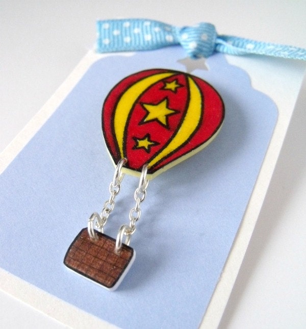 red and yellow stars hot air balloon brooch with dangly basket