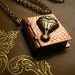 The Take Flight Locket - vintage luggage locket