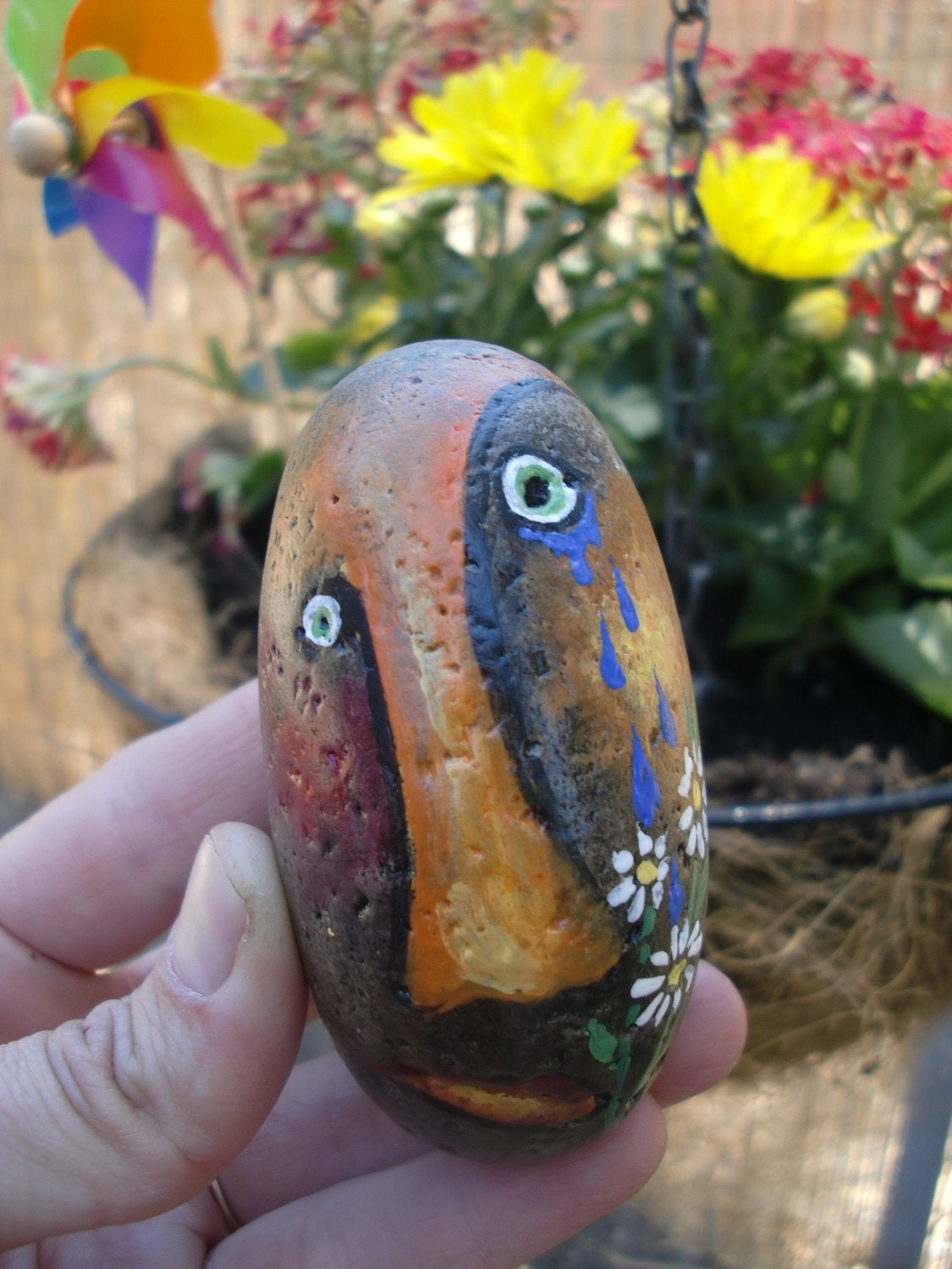 GARDENING PAL - pet rock does its part