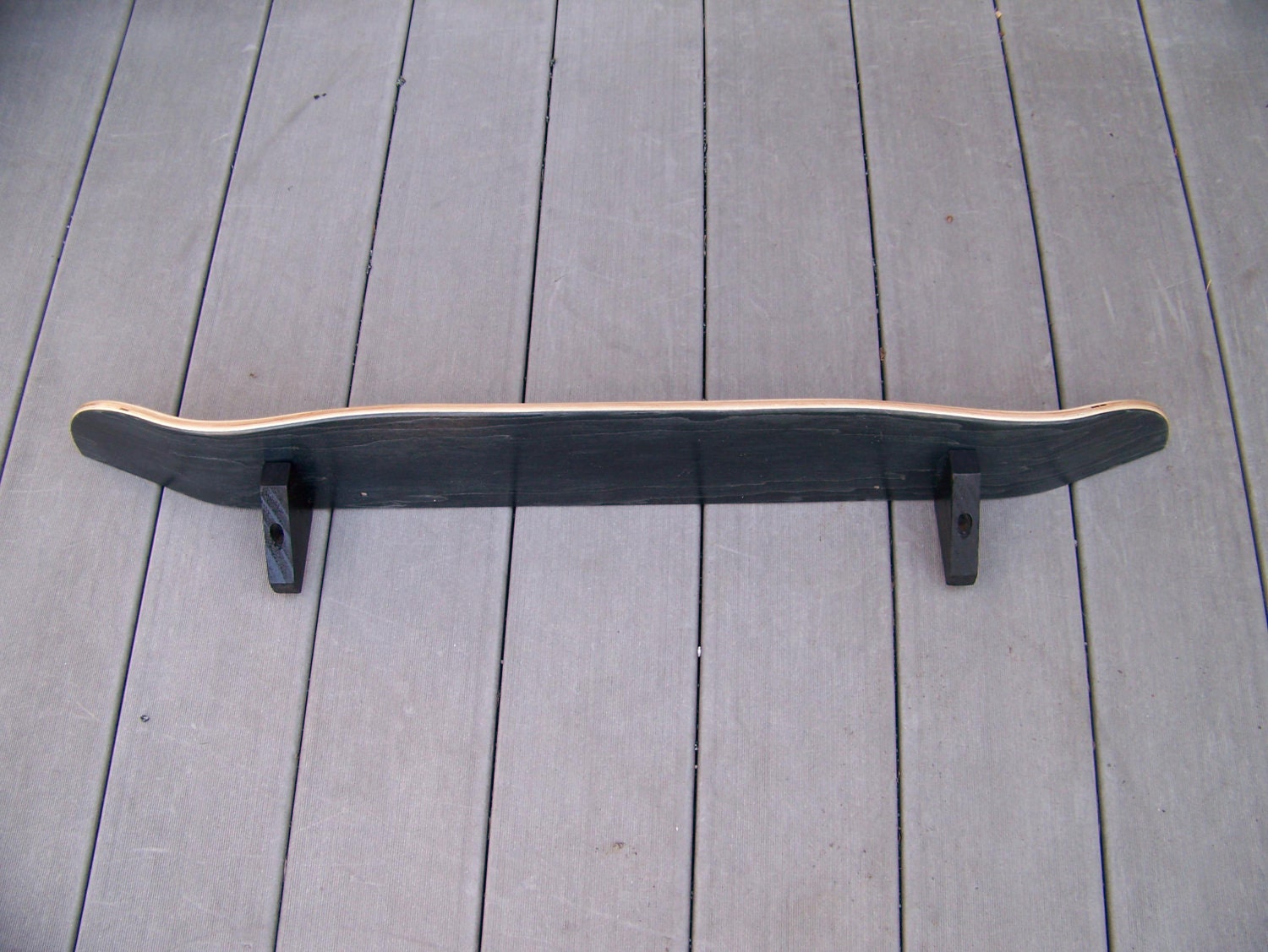 black stained skate shelf