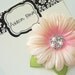 ON SALE new item........ peaches and pink three inch daisy with multi crystal and pearl center and green accent leaves
