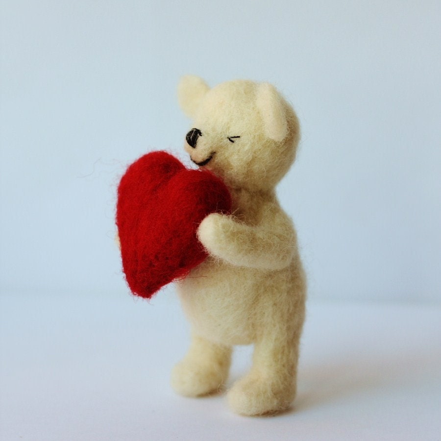 Woolly the shy Ted. Needlefelted white teddy bear with red heart.