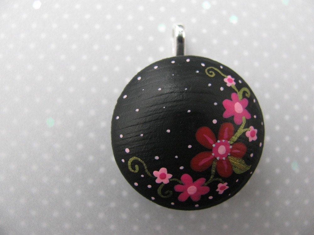 posies on black handpainted wooden pendant