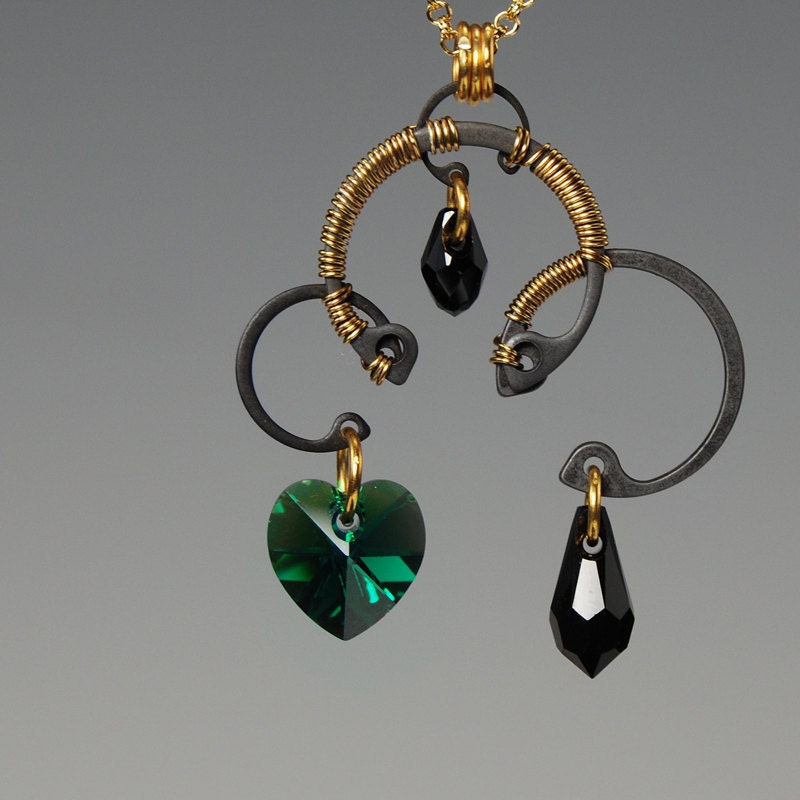 Uranus v5: Beautiful emerald Swarovski crystal industrial wire wrapped pendant