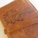 Leather journal or sketchbook featuring diagrammed bird with free personalization