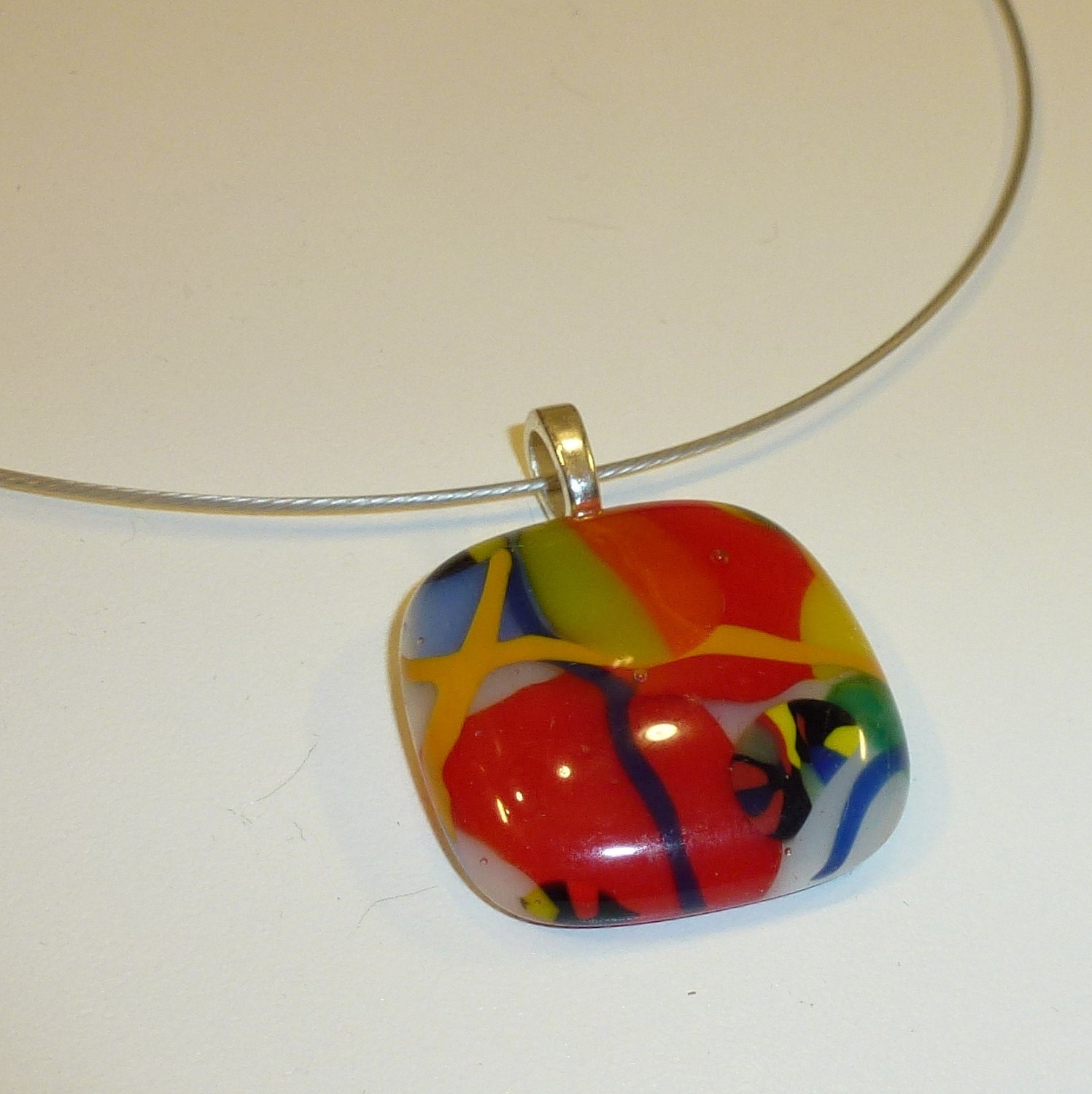 Pendant, Multicolored, red, yellow, blue, and white fused glass pendant - LotsaShimmer