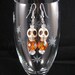 Stone Skull with iridescent orange Czech bead sterling dangle earrings