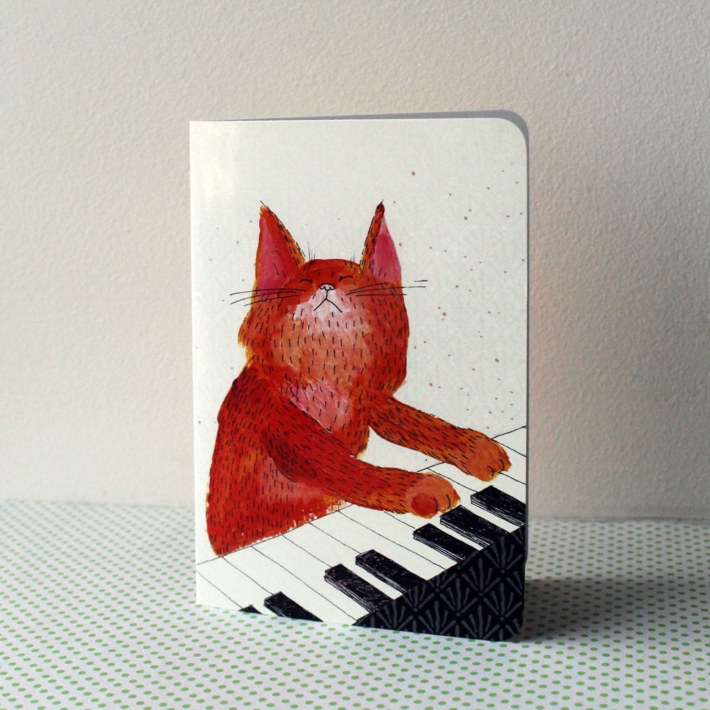 Greeting card - Ginger cat playing piano