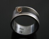 Wide ring with cognac diamond in 18K gold and oxidized silver. Made to order, needs four weeks to complete