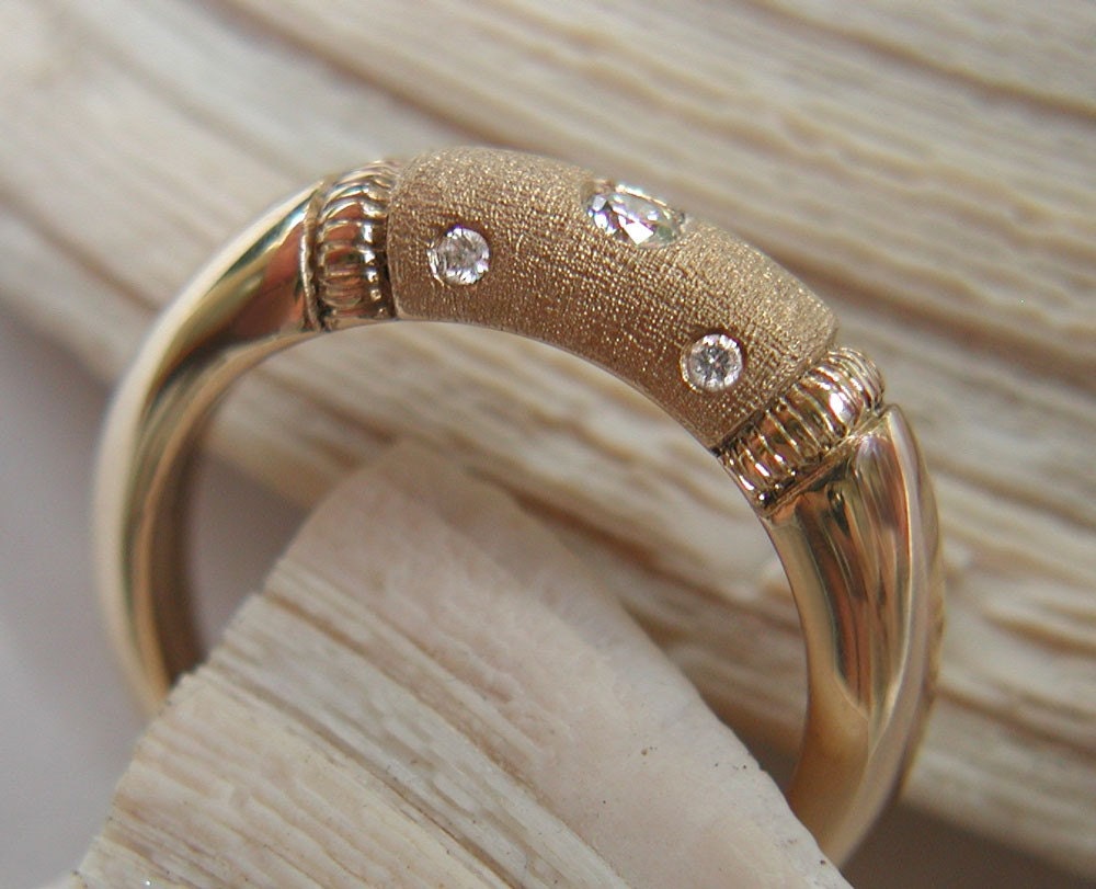 Wedding, engagement ring with five non conflict diamonds in textured, hammered  gold. Made to order, needs three weeks to complete.