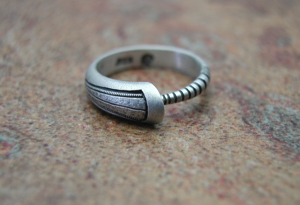 Ouroboros Ring, contemporary design, in textured, hammered and oxidized silver. Made to order, needs three weeks to complete
