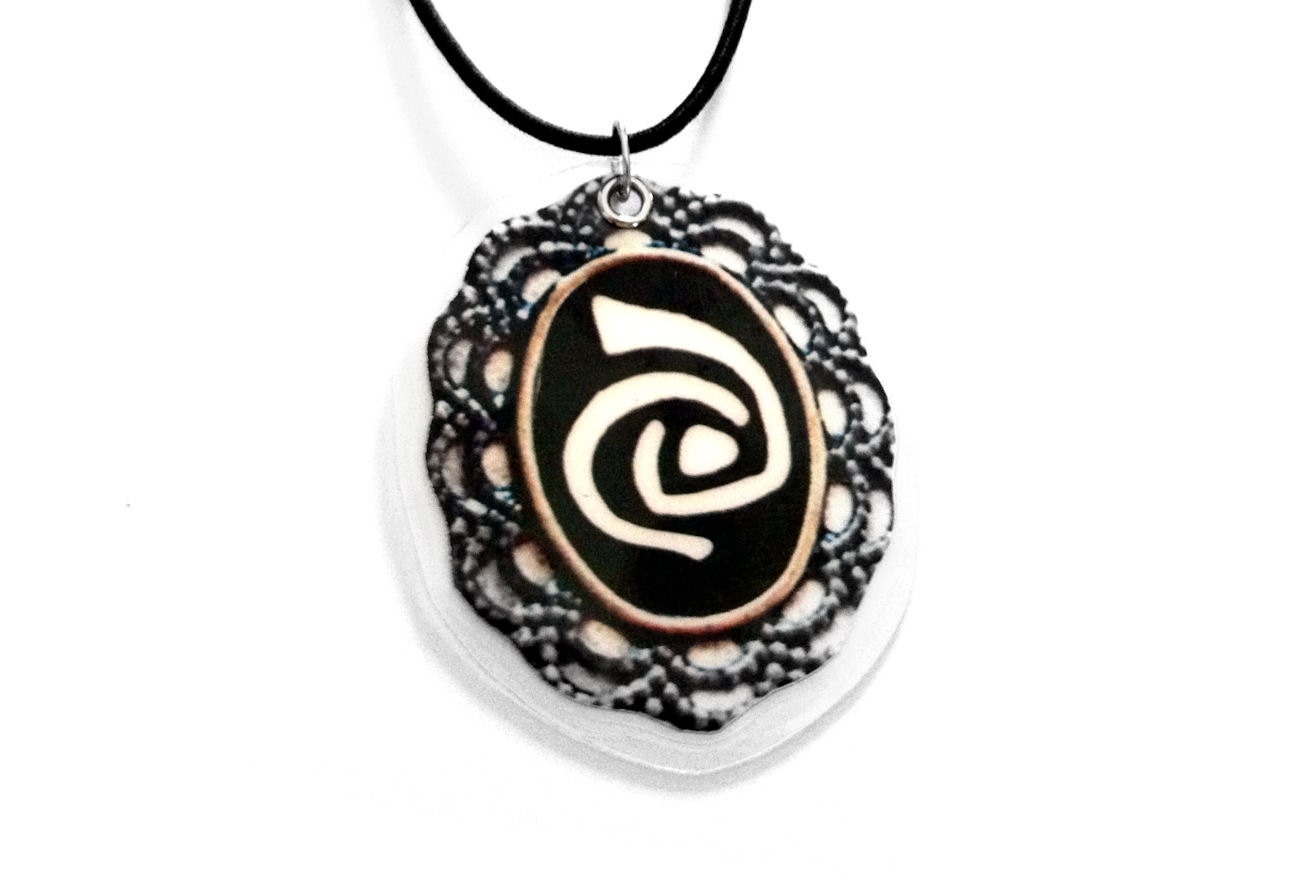 Roswell Necklace, Filigree Pendant with Black & White  Alien Symbol