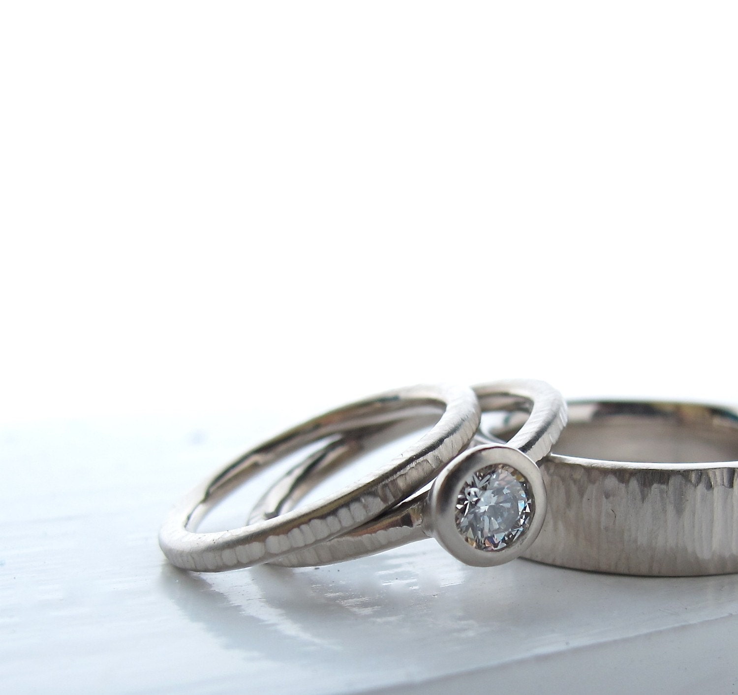 Diamond Pacific Ring his and hers engagement ring and matching wedding bands