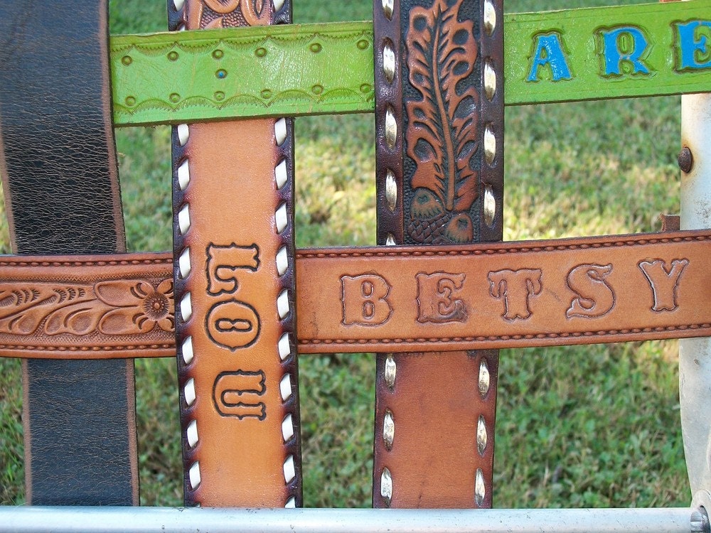 vintage aluminum folding LAWN CHAIR re-webbed with vintage western BELTS yee-haw.