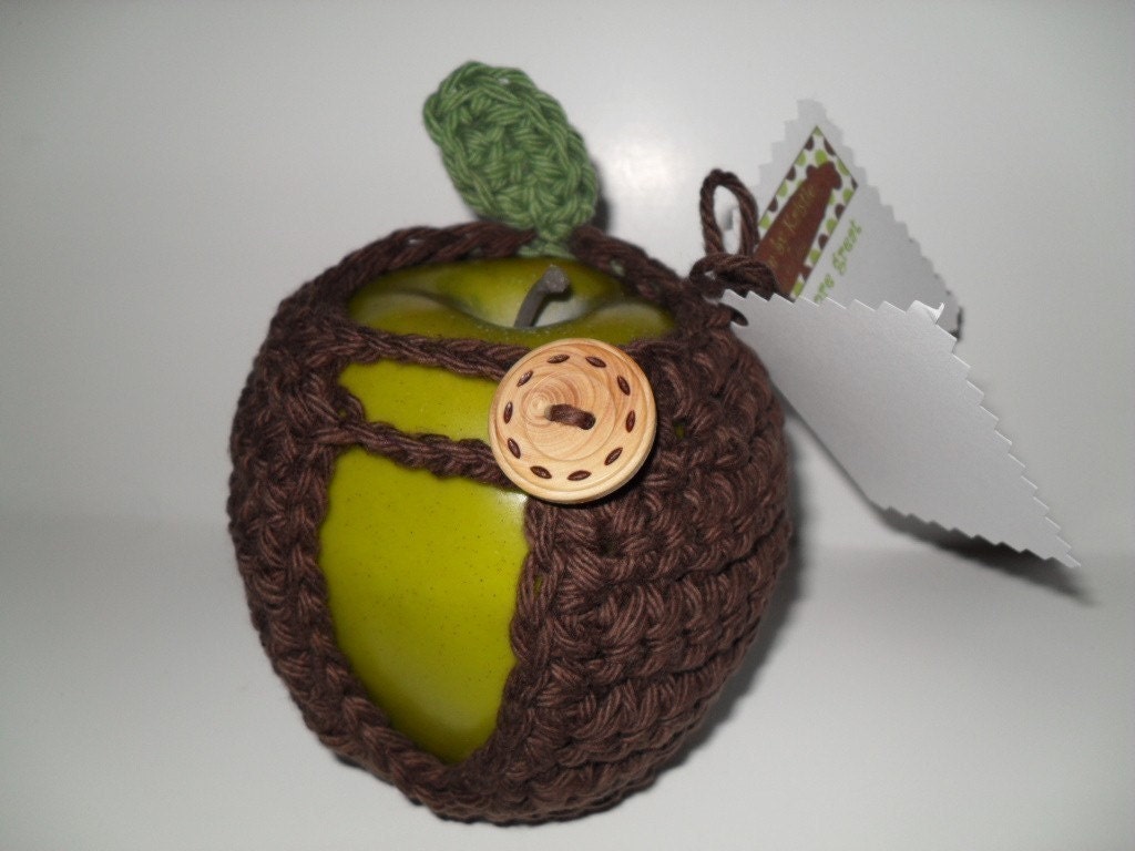 handmade crocheted apple cozy or apple jacket or apple coozie in beautiful chocolate brown with green leaf  eco friendly