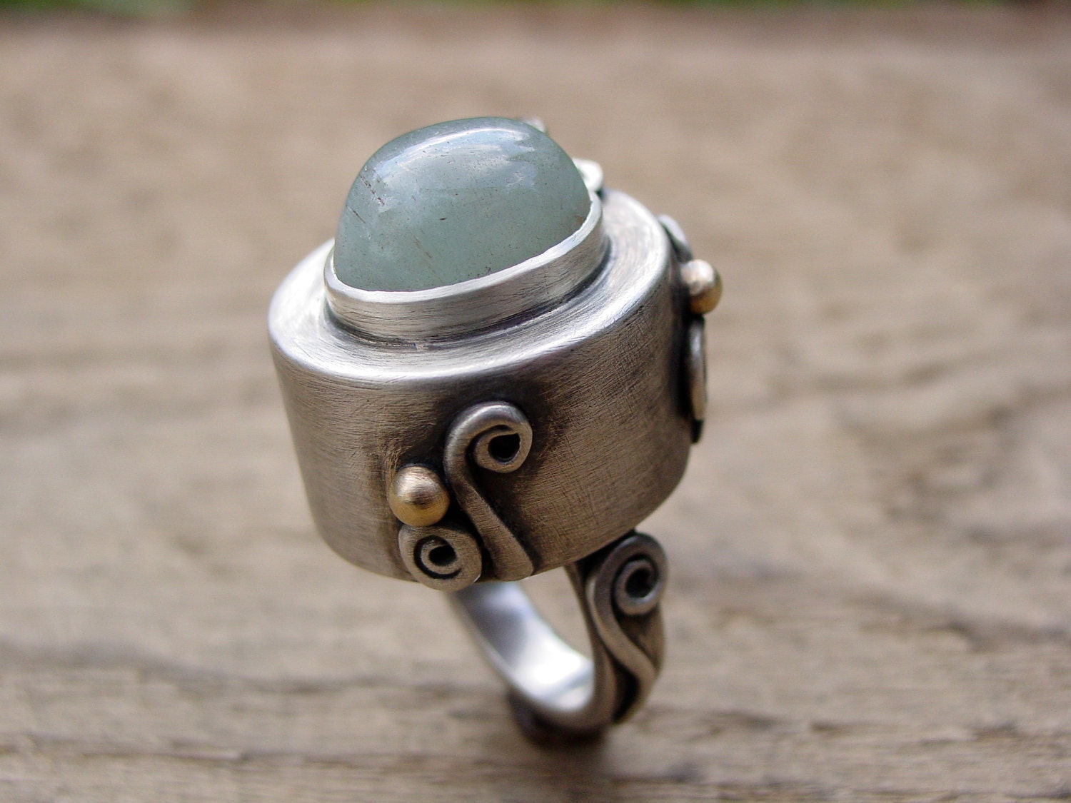 Sterling Silver Ring, with Cat's Eye Beryl and 14 kt gold "Wonderland" by Reagan Hayhurst