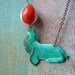 Sea Lion Pendant Circus Act Necklace  - Turquoise Patina Brass with Vintage Lucite Orange White Balancing Ball