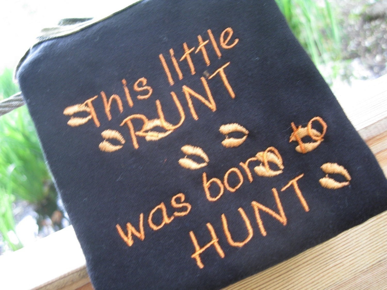 Embroidered Deer Hunting Camo Onesies.  Embroidered Deer tracks with the saying This little Runt was born to Hunt