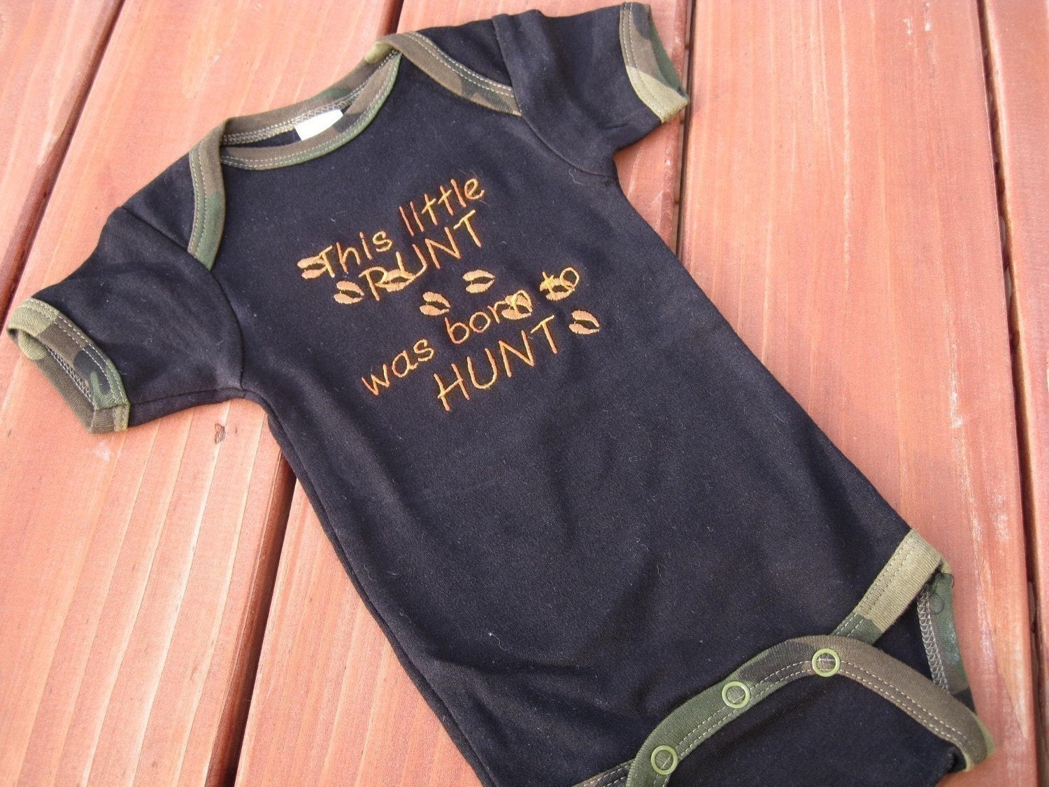 Embroidered Deer Hunting Camo Onesies.  Embroidered Deer tracks with the saying This little Runt was born to Hunt