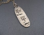 Chinese Fortune, A Fine Silver Pendant
