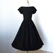 vintage 1950's dress ...pretty BETTY BARCLAY black ruffled bustle back full skirt shoulder skimming shawl collar pin-up cocktail party dress