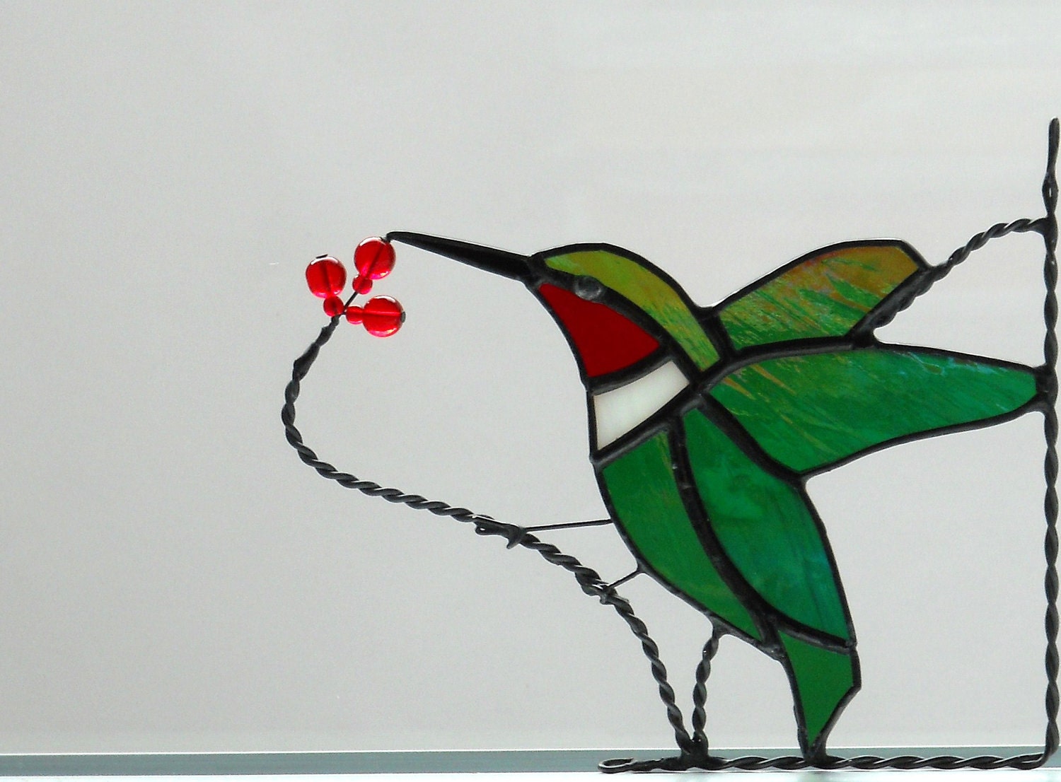 Humming bird / stained glass window corner