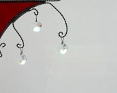 small stained glass window corner with3 crystals / dark red