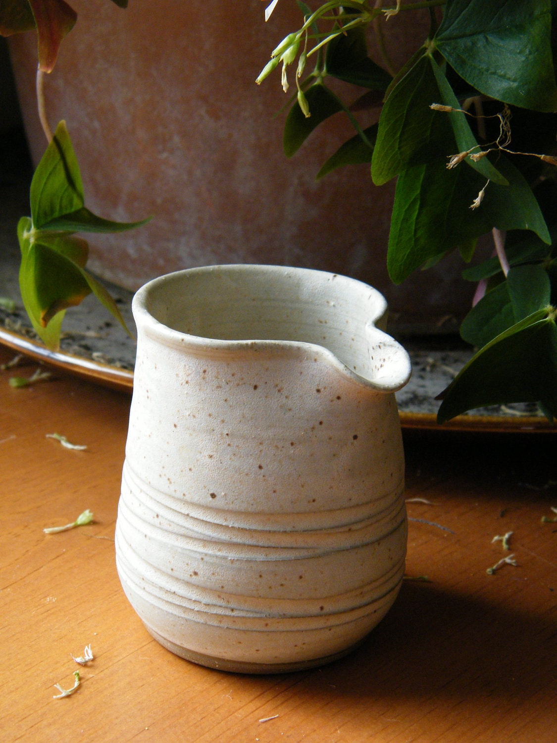 Small cream pitcher with no handle