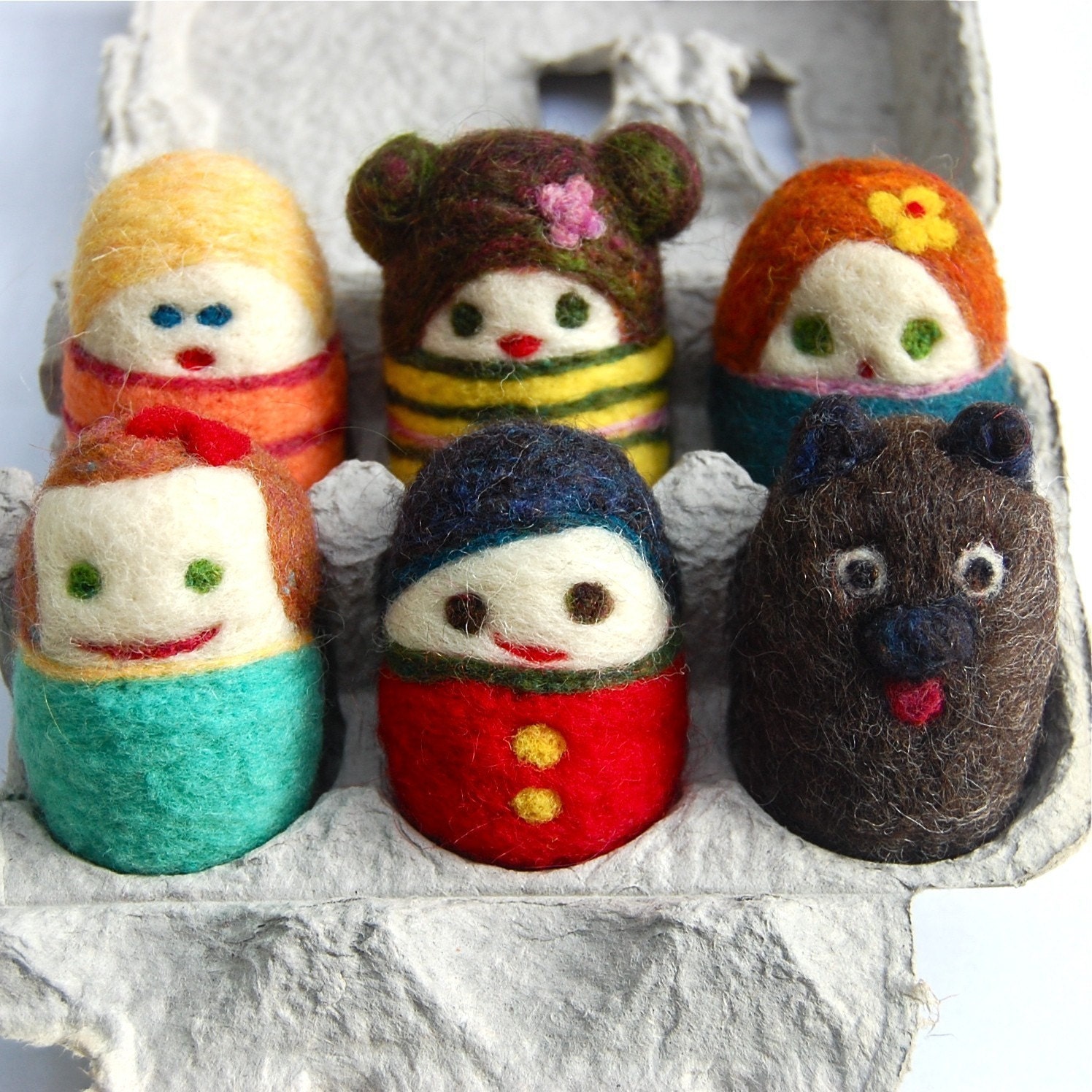 Set of 6 tiny egg people in egg carton and one egg dog