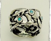 Sterling silver wide organic shaped gemstones ring with small blue opals - Fluidity.