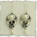 Make a wish -  Sculptural silver earrings with  dangling drop pearls.