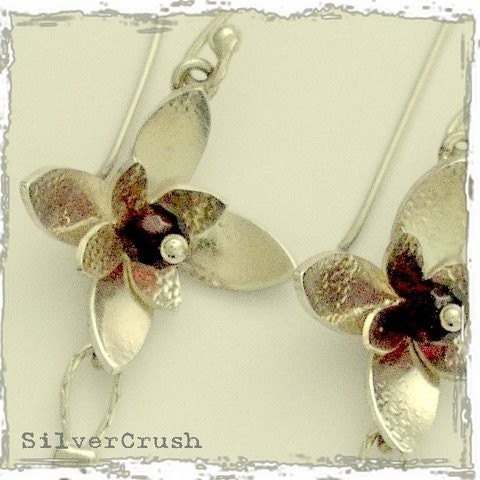 Long sterling silver flower dangle earrings with garnets - Hanging Orchid.