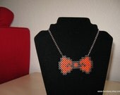 Say Cheese bow necklace