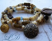Three Stacking Bracelets with vintage buttons and beads more than 100 year old