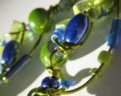 EXQUISITE. lime green and periwinkle blue wire and  bead earrings